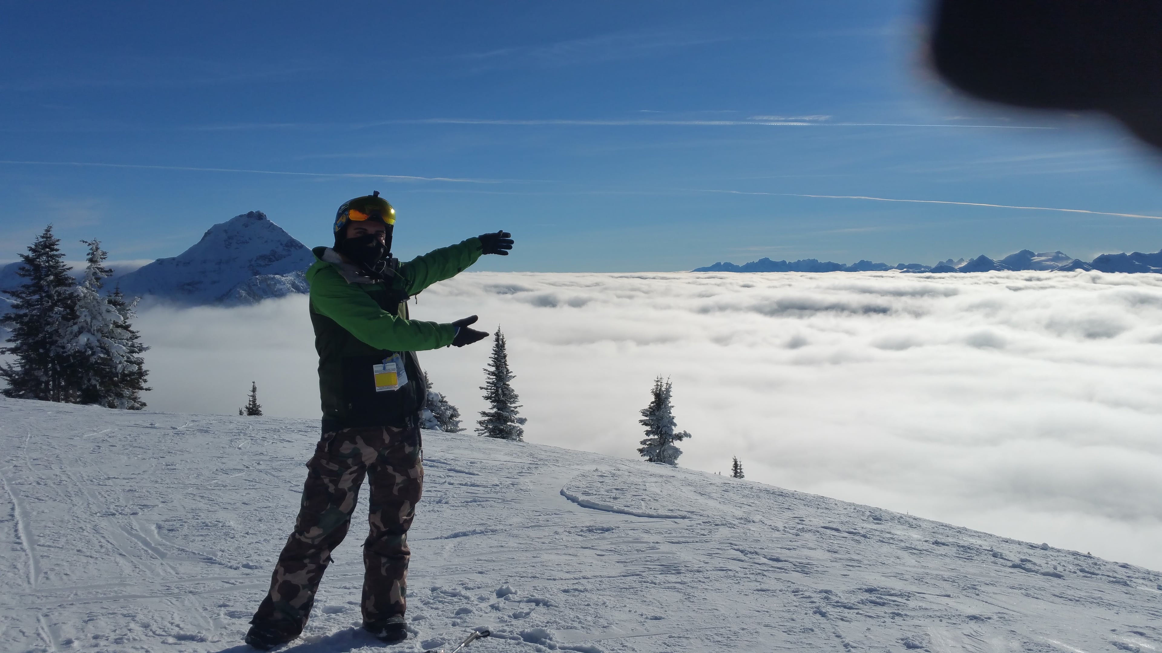 Snowboarding above the clouds in the Alps